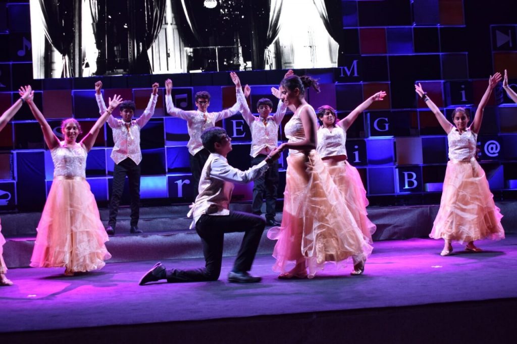 Middle School students performing in school events