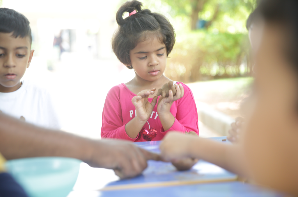 Preschoolers exploring nature through outdoor activities