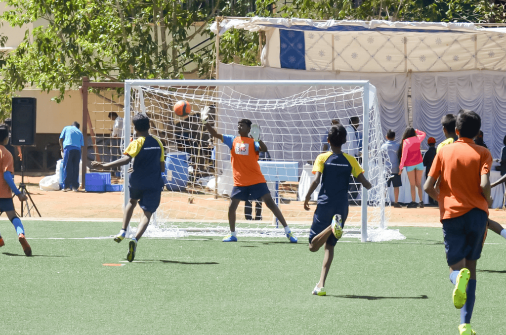 Students competing in an inter-house football tournament